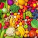 Vegetables and fruits large overhead mix group on colorful background in studio