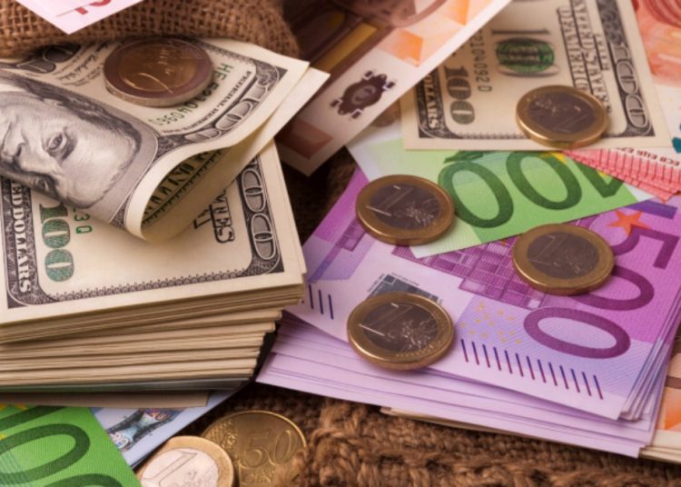 Paper money euro dollar banknotes coins sack