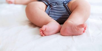 Close-up legs of a newborn baby